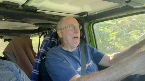 Mike (K6YMM) after getting some new Sierra Nevada pin striping on his Jeep.